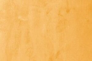 Amostra de microcimento KCberry na cor Funky Yellow — acabamento continuo, sem juntas