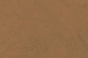 Amostra de microcimento PURE base cal KCberry na cor Chestnut — textura mineral continua, sem juntas