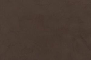 Amostra de microcimento PURE base cal KCberry na cor Marron — textura mineral continua, sem juntas