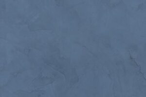 Amostra de microcimento PURE base cal KCberry na cor Sea Blue — textura mineral continua, sem juntas