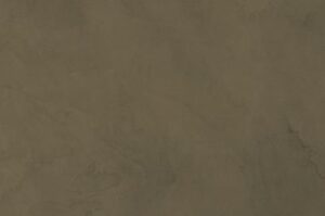Amostra de microcimento PURE base cal KCberry na cor Swamp — textura mineral continua, sem juntas