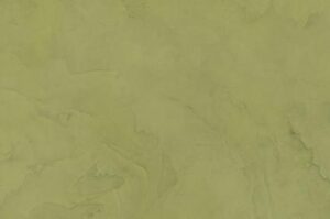 Amostra de microcimento PURE base cal KCberry na cor Tea Green — textura mineral continua, sem juntas