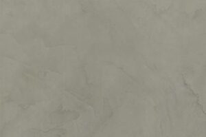 Amostra de microcimento PURE base cal KCberry na cor Volcano — textura mineral continua, sem juntas
